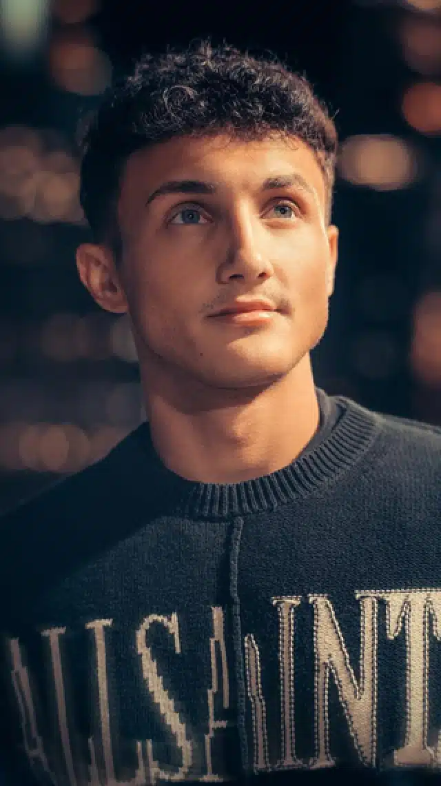 a man looking up to the side